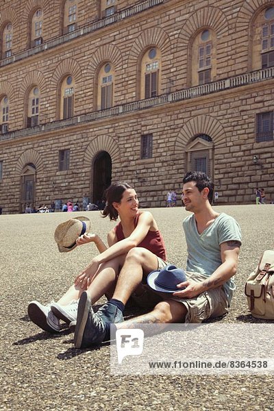 Couple relaxing  Palazzo Pitti  Florence  Tuscany  Italy