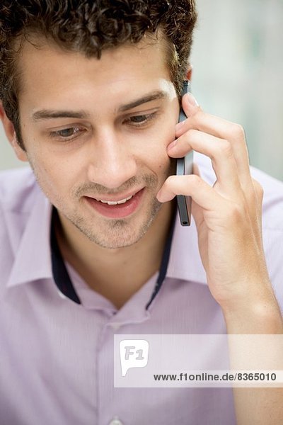 Young man on mobile phone