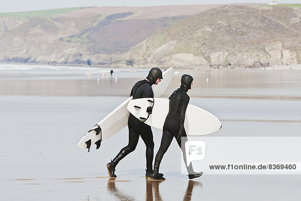 Surfers On Newgale Beach Pembrokeshire Coast Path  Wales  United Kingdom