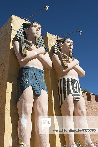 Two Statues Of Egyptian Male Figures