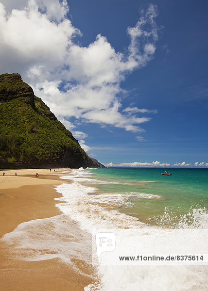 Waves Splash On This Beach Along The Kalalau Trail And Part Of The Napali Coast  Kauai  Hawaii  United States Of America