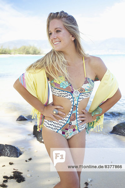 A young woman posing on the beach of an hawaiian island Maui  Hawaii  United States of America