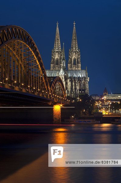 Cologne cathedral  UNESCO World Heritage Site  and Hohenzollern bridge at dusk  Cologne  Germany  Europe