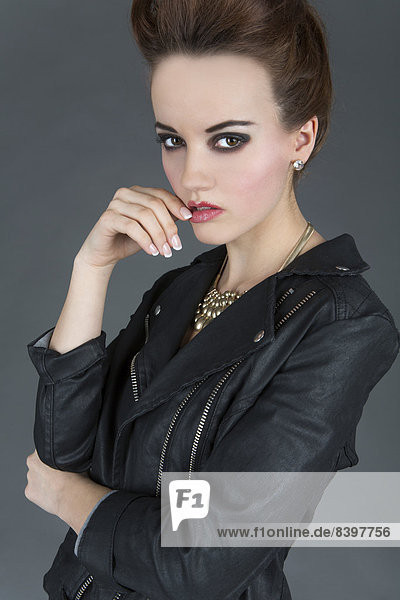 Young woman wearing a leather outfit  fashion