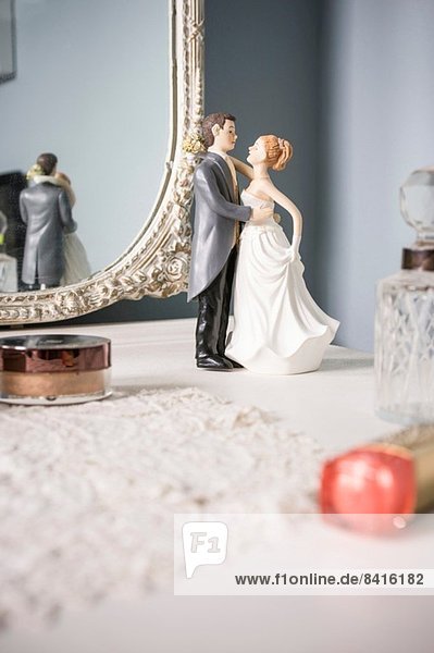 Wedding figurines on dressing table