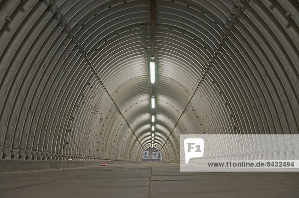Atmosphere Ambience Germany Duisburg dark Europe underpass subway light tubes metal cyclist tunnel underpass way North Rhine-Westphalia