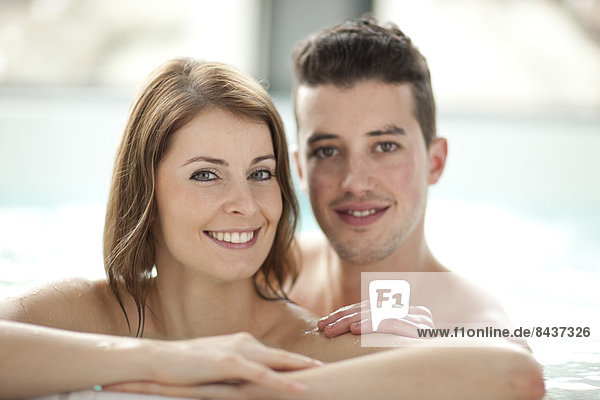 Switzerland  Europe  bath  bathing  portrait  couple  man  two  woman  brown-haired  water  water sport  wellness  Well beeing  water  health
