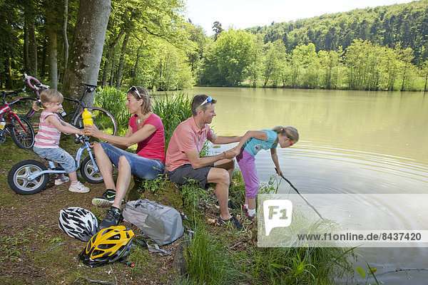 Switzerland  Europe  canton  JU  Bonfol  family  Jura  wheel  bicycle  bicycle  bicycles  bike  riding a bicycle  wood  forest  lake