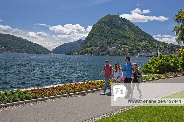 Switzerland  Europe  group  woman  man  couple  couples  lake  canton  TI  Ticino  Southern Switzerland  park  walking  Lugano  lake Lugano  San Salvatore  Parco Ciano