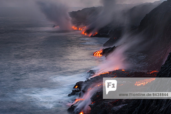 Puu Oo  USA  United States  America  Hawaii  Big Island  Hawaii Volcanoes  National Park  volcano  lava  sea  Pacific  coast  steam  dusk  fire