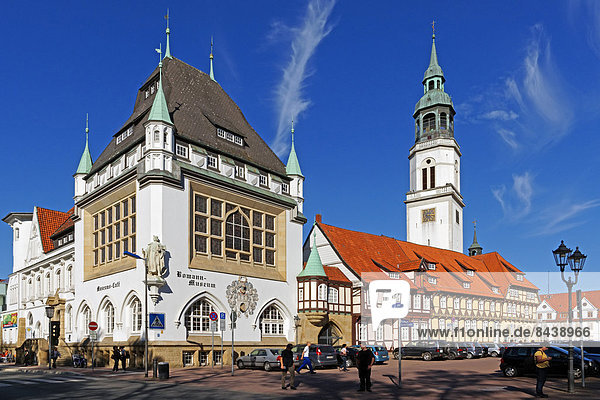 Europe  Germany  Lower Saxony  Celle  castle square  Bomann  museum  town church Saint Marien  old city hall  architecture  building  construction  historical  people  signs  place of interest  landmark  tourism  street  lanterns  tower  church  framework