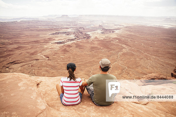 USA  Utah  Young couple looking over Canyonlands National Park