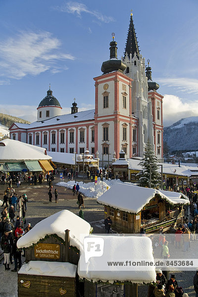 Christmas market in front of the Mariazell Basilica on the main square of Mariazell Upper Styria Styria Austria