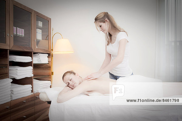 Woman relaxing with a massage