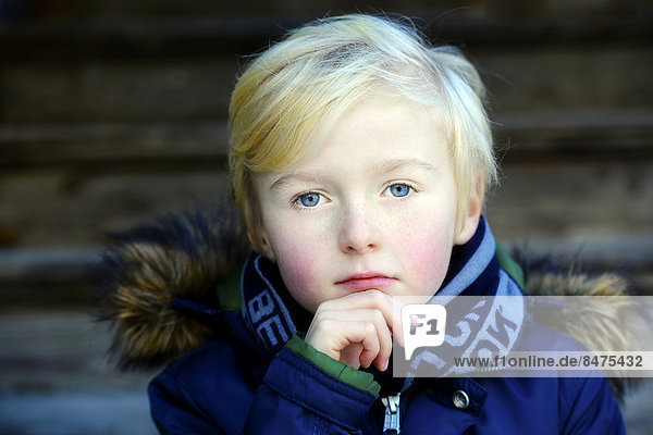 Boy  7 years  pensive  portrait