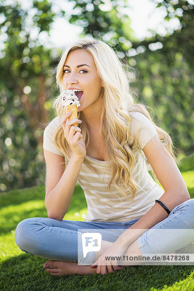 Portrait of teenage girl (16-17) eating ice cream