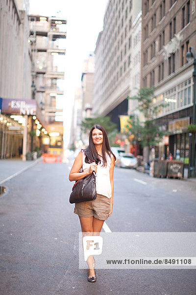 Young woman on street  New York City  USA