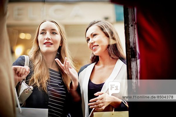 Young women window shopping