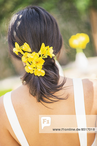 Newlywed bride with flowers in hair
