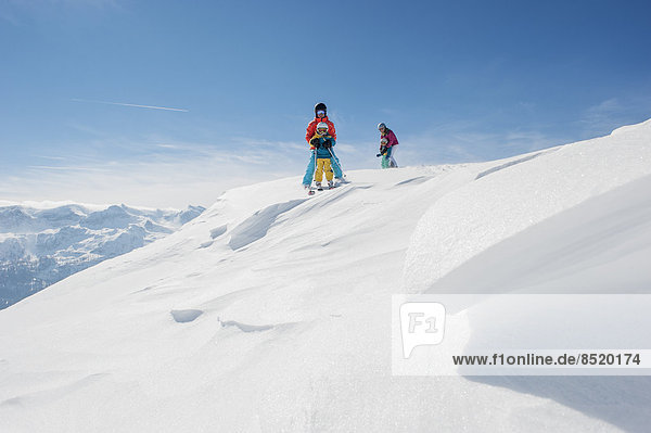 Austria  Salzburg Country  Altenmarkt-Zauchensee  Family skiing in mountains