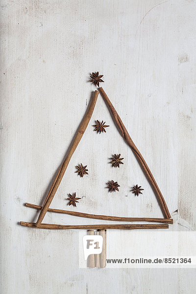 Christmas tree shaped by cinnamon sticks and star anise