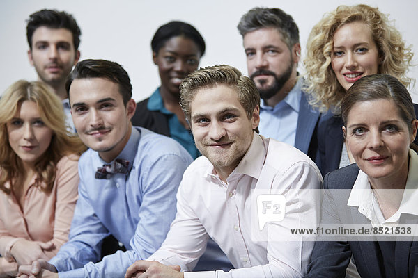 Germany  Neuss  Group of business people  leaning on railing