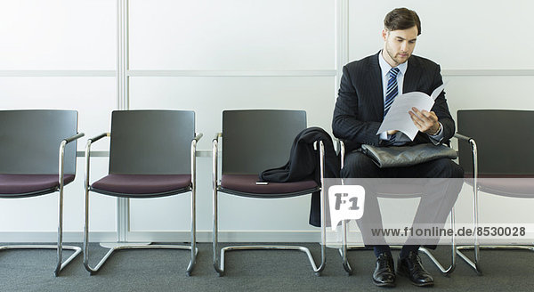 Businessman sitting in waiting area