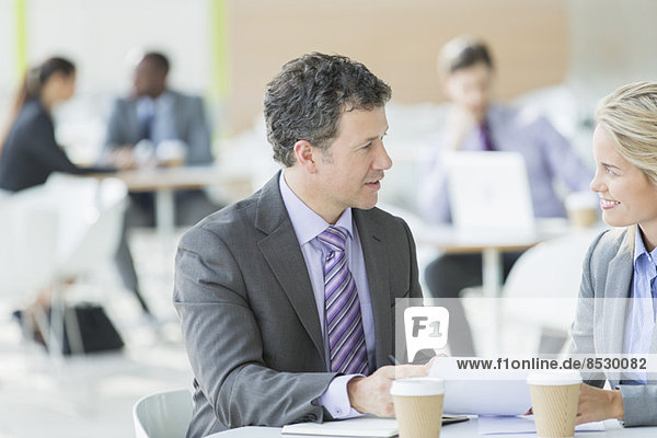 Business people talking at cafe