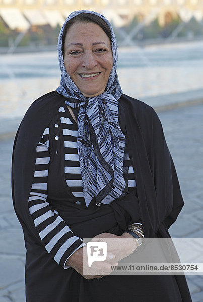Iranian woman wearing a headscarf  Isfahan  Isfahan Province  Persia  Iran