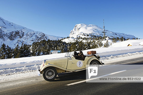Vintage car rally  WinterRAID 2013  MG TD  built in 1952  Ofen Pass  Zernez  Graubünden  Switzerland