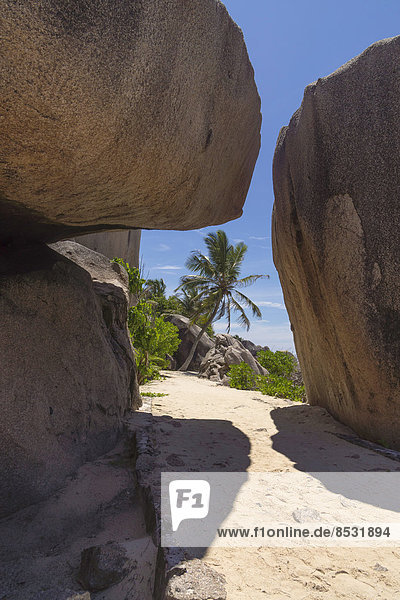 Typical rock formations in the Seychelles at a sandy beach  Anse Union  La Digue  Seychelles