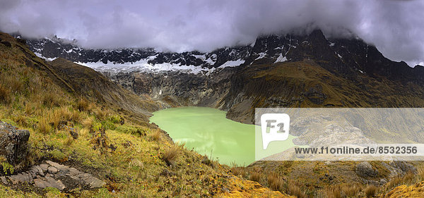 Laguna Amarilla or Laguna Collanes with the peaks of El Altar or Kapak Urku  Riobamba  Region Cotopaxi  Ecuador