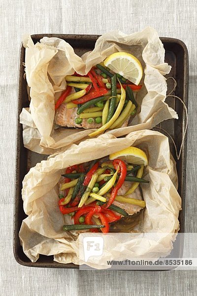 Baked fillet of trout with vegetables