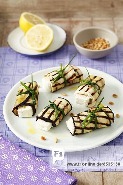 Rolled aubergine slices stuffed with feta
