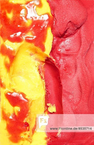 Gemischtes rotes und gelbes Eis (Close Up)