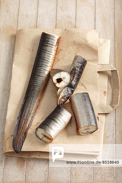 Smoked eel on a paper bag