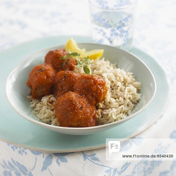 Meatballs with tomato sauce and rice