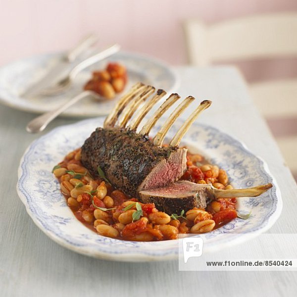 Rack of lamb on a bean and tomato medley