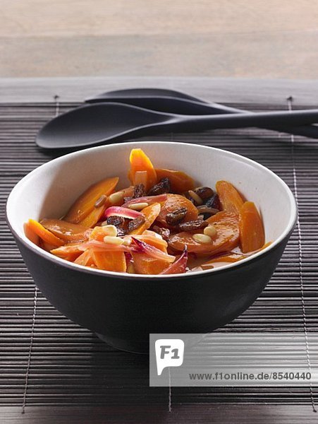 Carrot salad with pine nuts  red onions and raisins