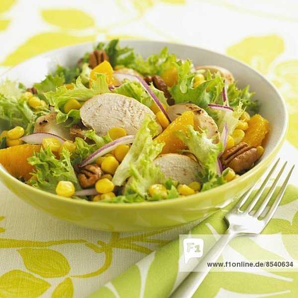 Lollo biondo lettuce with chicken oranges  sweetcorn and pecan nuts