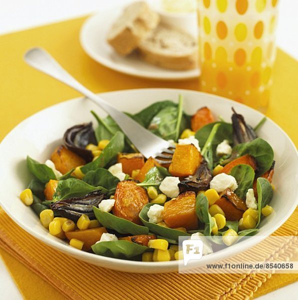 Salad with roasted diced squash  lamb's lettuce  sweetcorn and feta