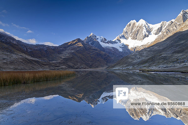Reflection of the mountain peaks in Laguna Mitucocha  Cordillera Huayhuash  Peru