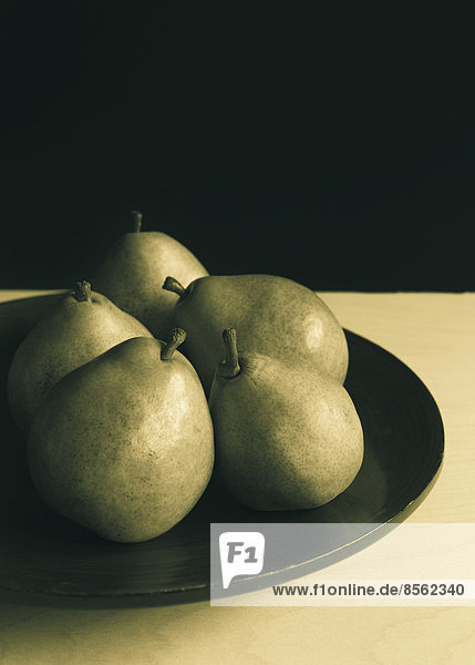 Bowl of green Anjou pears