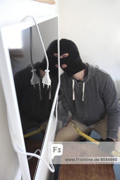 France  robber in a house.