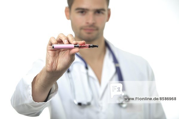 France  young doctor holding an electronic cigarette.