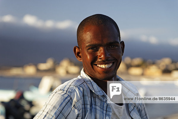 Smiling Omani man  Mirbat  Dhofar region  Sultanate of Oman  Arabian Peninsula