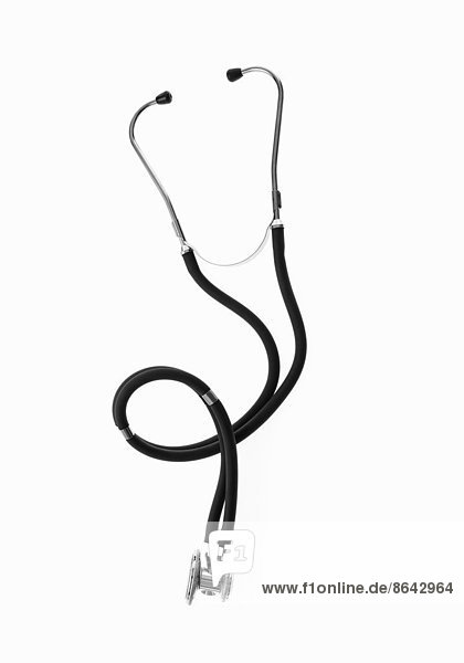 A doctor's stethoscope a diagnostic instrument for assessment of health. Black tubing. Ear pieces and a chest piece.