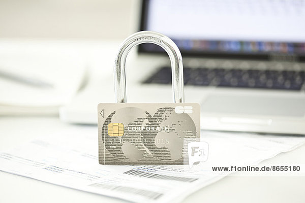 Credit card and lock representing internet security