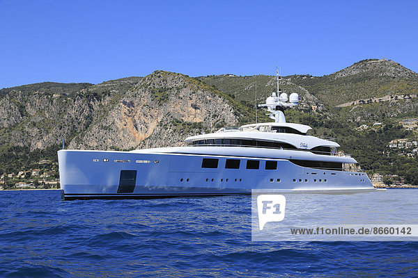 Benetti motor yacht Nataly at anchor in front of Eze Bord de Mer  Maritime Alps  Provence Alpes Côte d'Azur  France