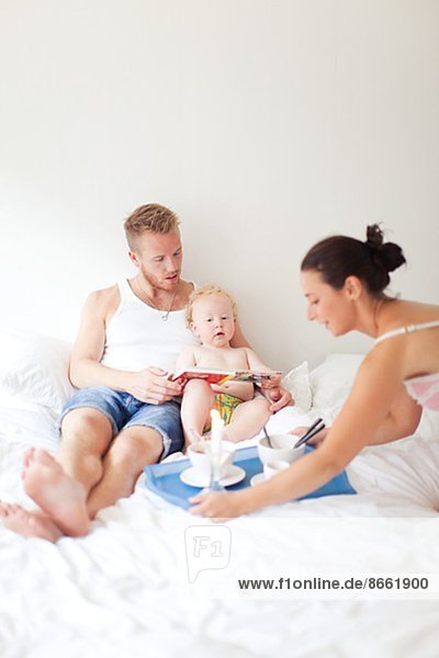 Family breakfast in bed  Vaxjo  Smaland  Sweden